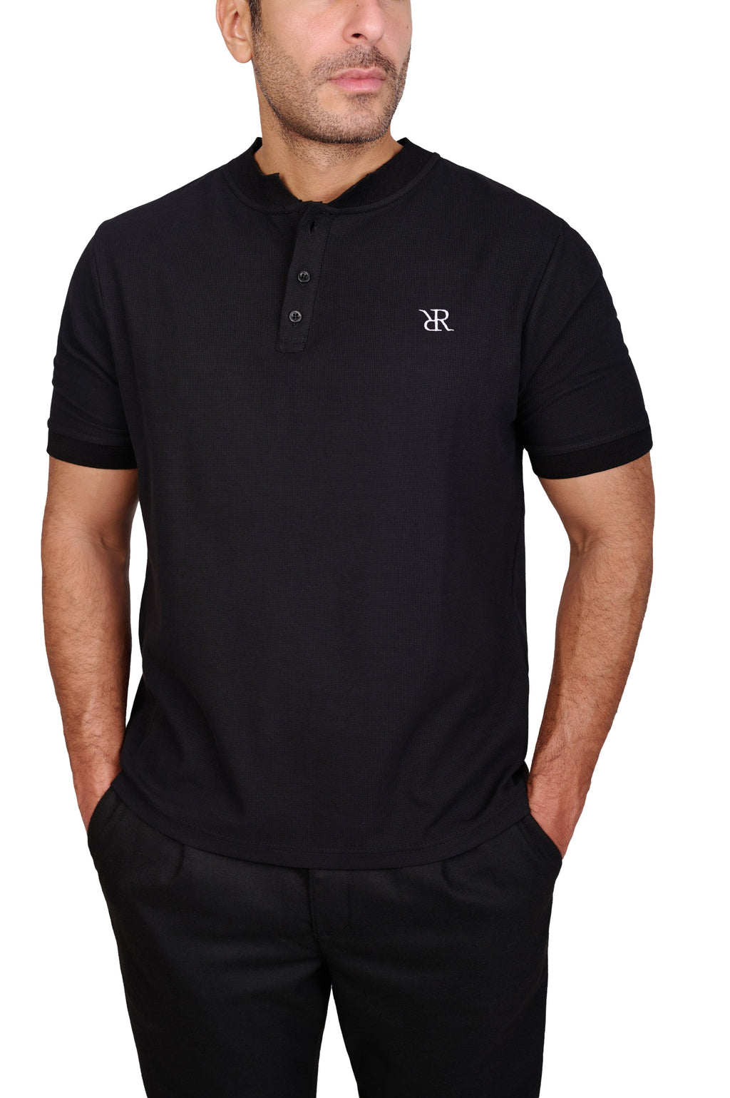 Rflx Reflection Polo in black, close view of the knit face, three-button placket and white RR monogram