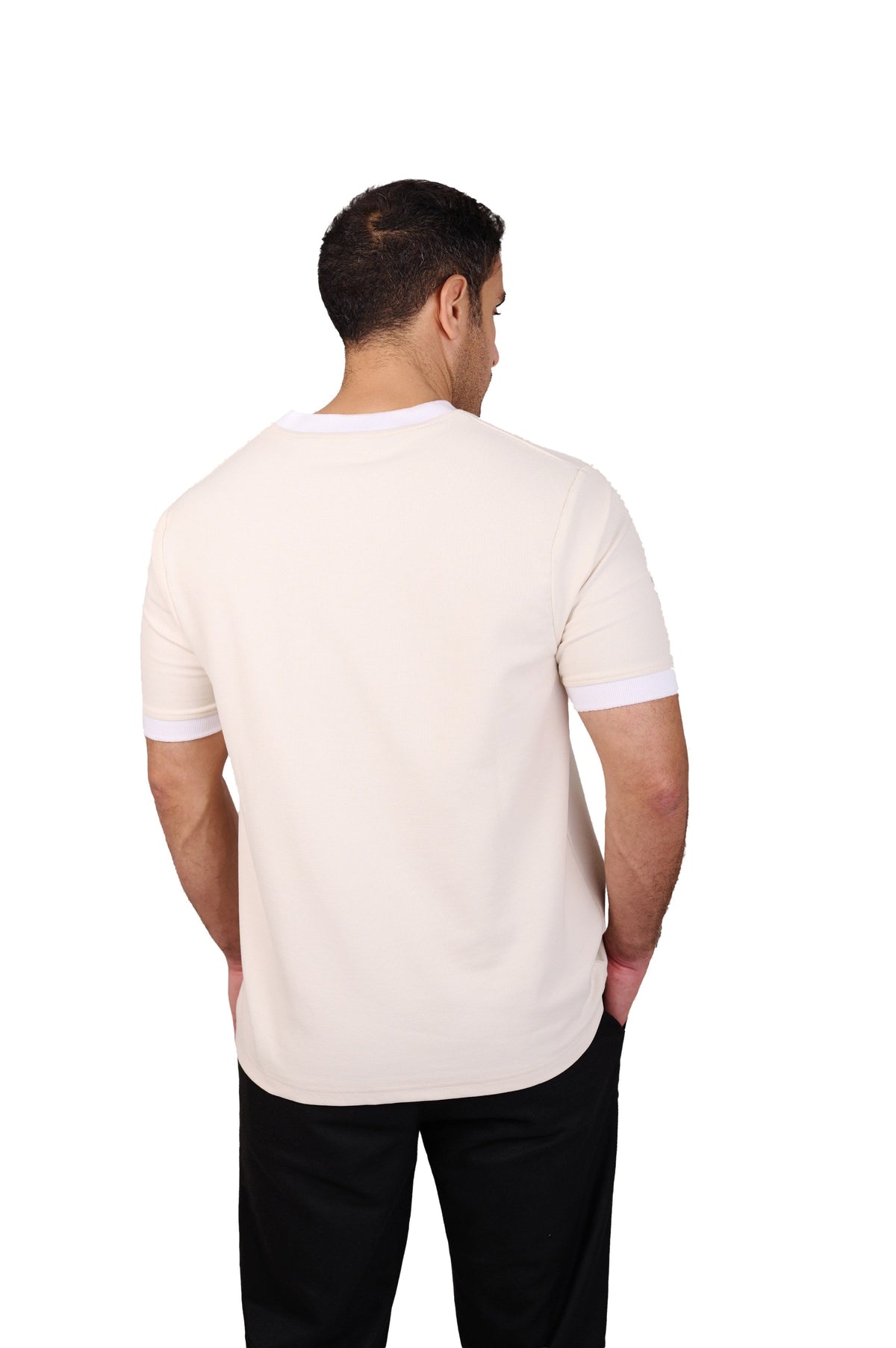 Rflx Reflection Polo, a cotton knit polo with a ribbed mandarin band collar, in cream with white ribbed trim, back view showing the plain body and curved hem