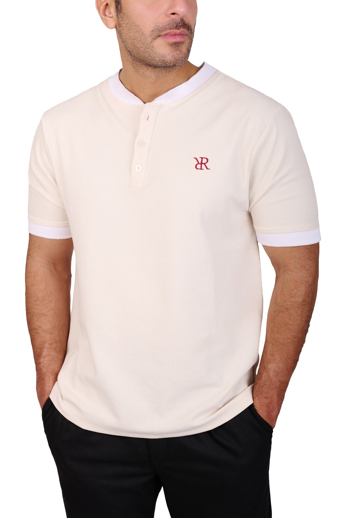 Rflx Reflection Polo in cream, close view of the knit face, three-button placket and crimson RR monogram