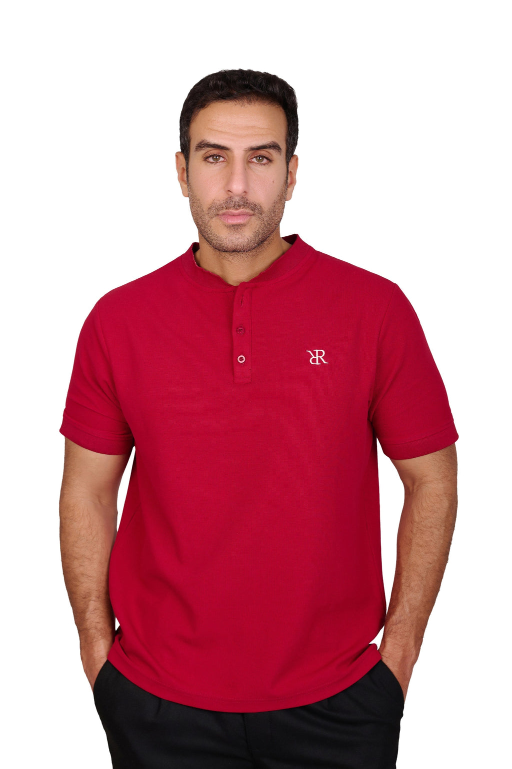 Rflx Reflection Polo, a cotton knit polo with a ribbed mandarin band collar, in crimson, front view worn with black trousers