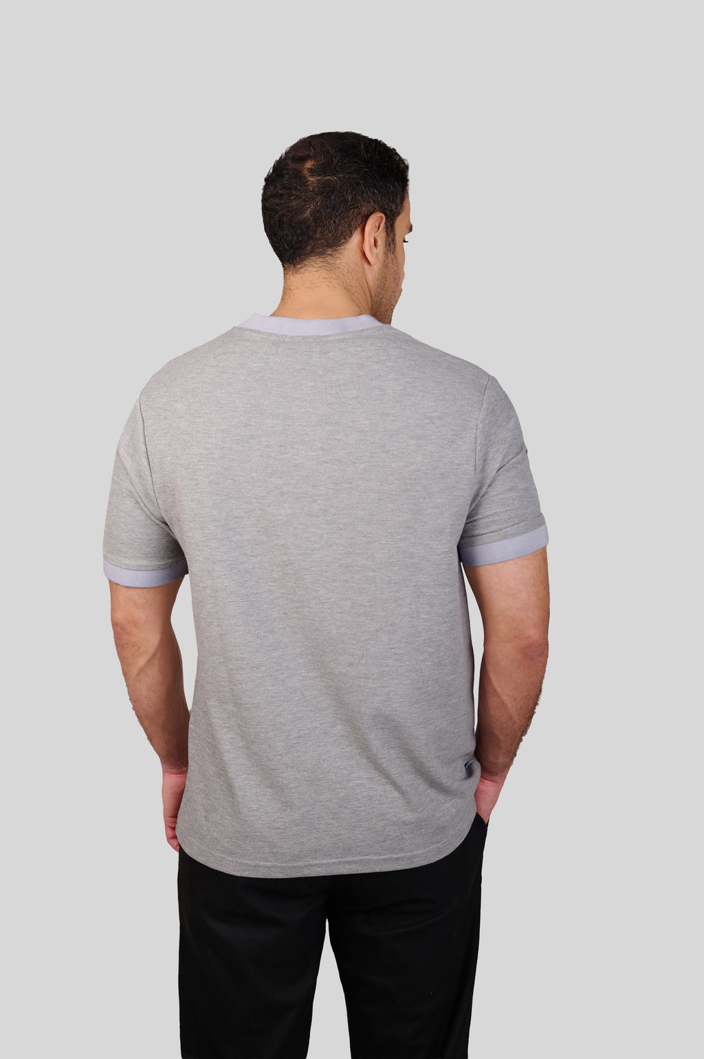 Rflx waffle-knit mandarin collar henley tee in heather grey with lilac ribbed trim, back view showing the plain body and ribbed collar