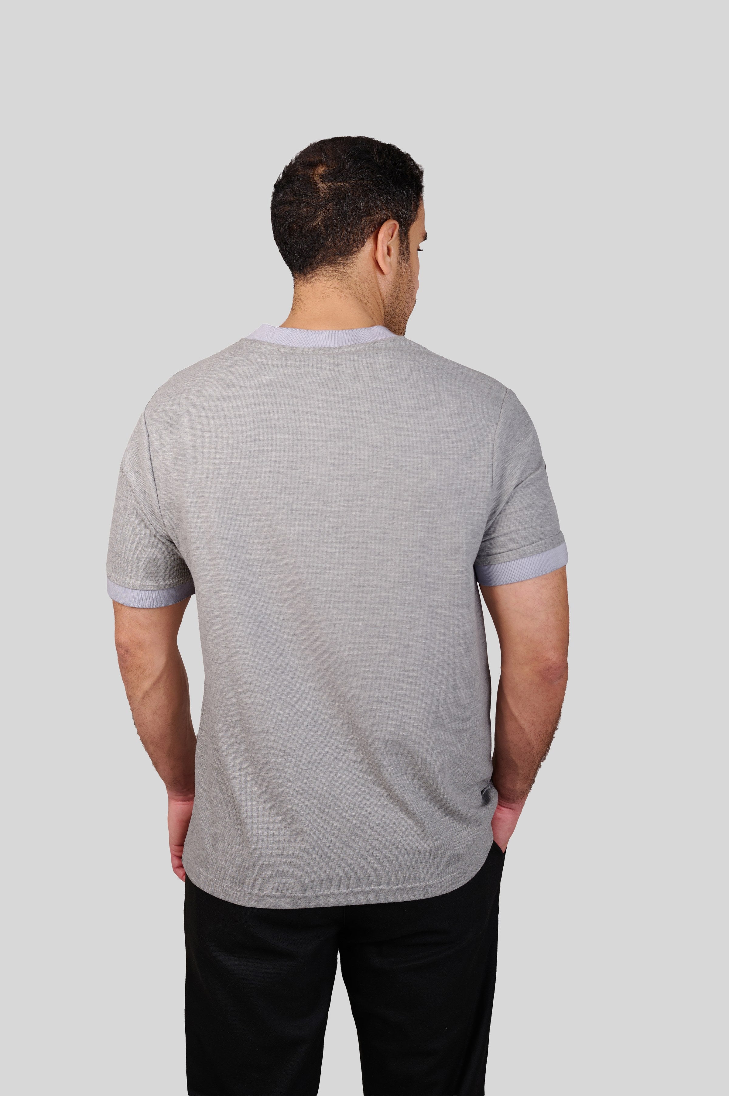 Rflx waffle-knit mandarin collar henley tee in heather grey with lilac ribbed trim, back view showing the plain body and ribbed collar